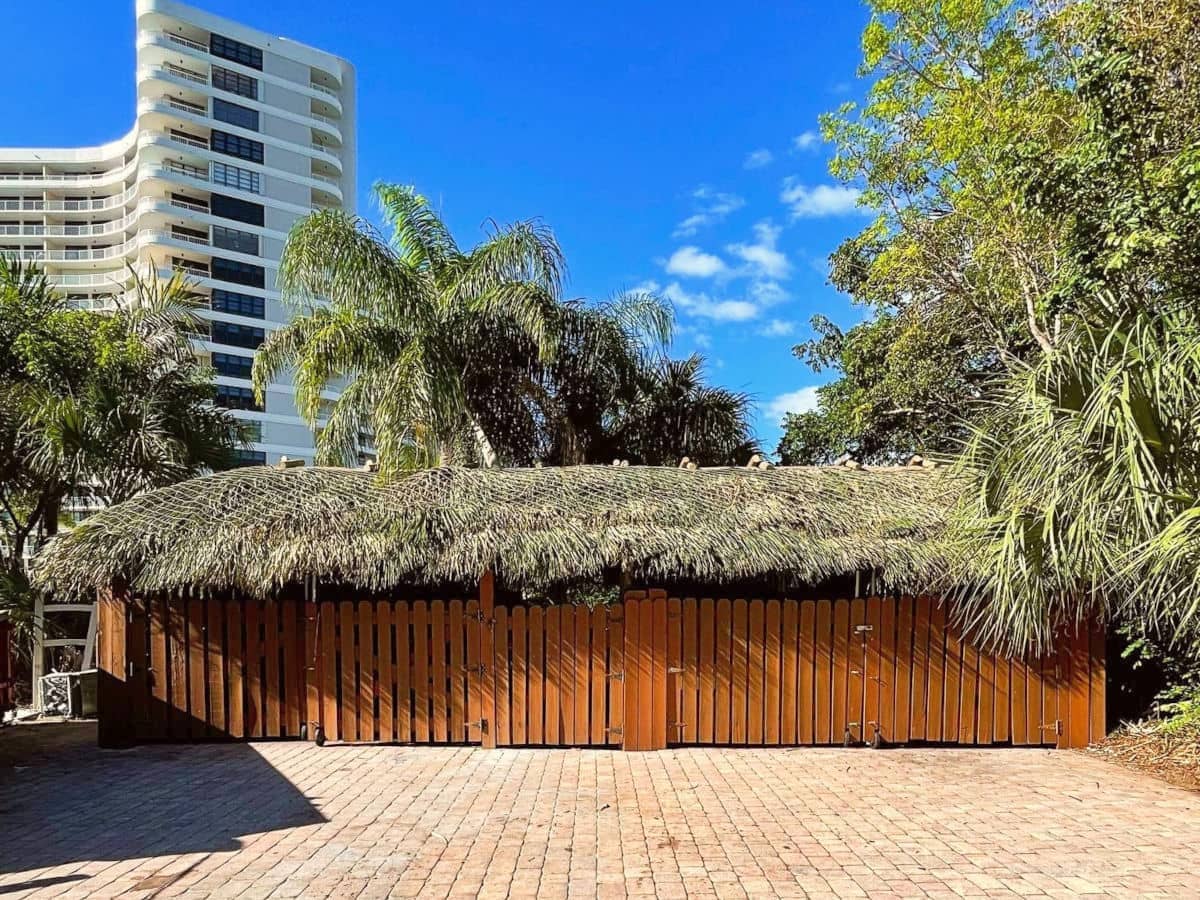 Commercial tiki project built with fencing on the walls and gates in the front.